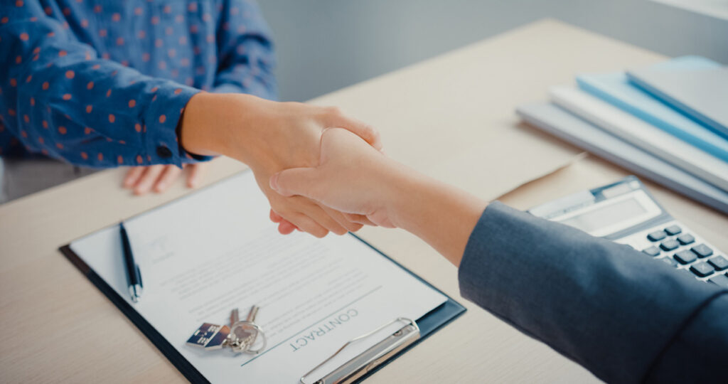 General Sales Agent signing contract to represent travel company in new market